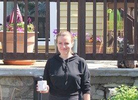 Natalie Perko in front of her home on the North Side